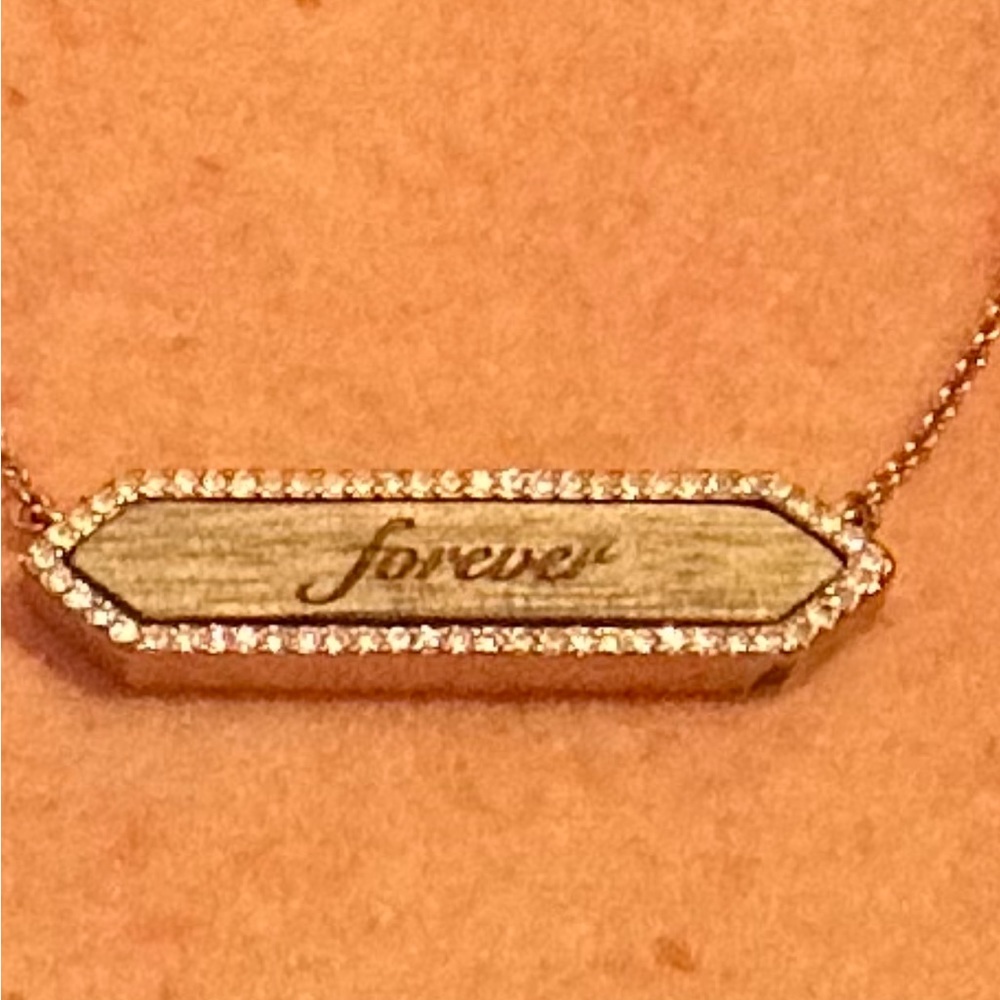 Stella and dot necklace says “forever”